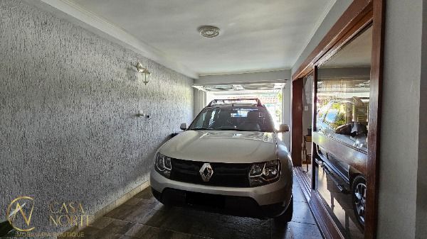 Casa à venda com 3 quartos, 147m², 2 suítes, 3 vagas, Acesso Nelson Silva no bairro Vila Nova em Porto Alegre