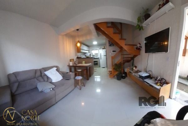 Casa à venda com 2 quartos, 55m², 2 vagas, Rua das Espatódeas no bairro Ponta Grossa em Porto Alegre