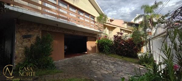 Casa à venda com 5 quartos, 430m², 1 suíte, 5 vagas, Rua Doutor David de Azevedo Gusmao no bairro Jardim Isabel em Porto Alegre