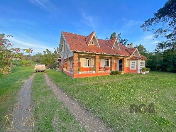 Sítio à venda com 5 quartos, 500m², 2 suítes, 3 vagas, Beco Passo da Taquara no bairro Lami em Porto Alegre
