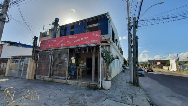 Prédio Comercial à venda com 4 quartos, 353m², 3 suítes, 2 vagas, Rua Elvira Dendena no bairro Hípica em Porto Alegre