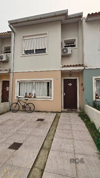 Casa de Condomínio à venda com 3 quartos, 144m², 1 suíte, 2 vagas, Avenida Edgar Pires de Castro no bairro Hípica em Porto Alegre