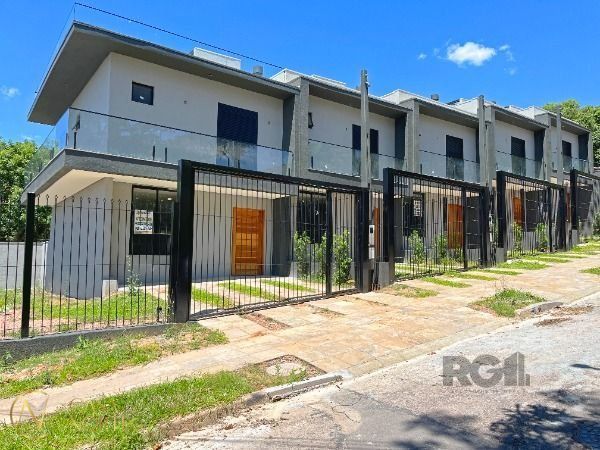 Casa de Condomínio à venda com 3 quartos, 118m², 1 suíte, 2 vagas, Rua Liberal no bairro Tristeza em Porto Alegre