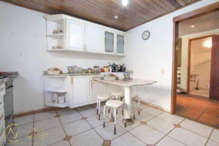 Casa à venda com 4 quartos, 450m², 3 suítes, 4 vagas, Rua Edgar Luiz Schneider no bairro Ipanema em Porto Alegre