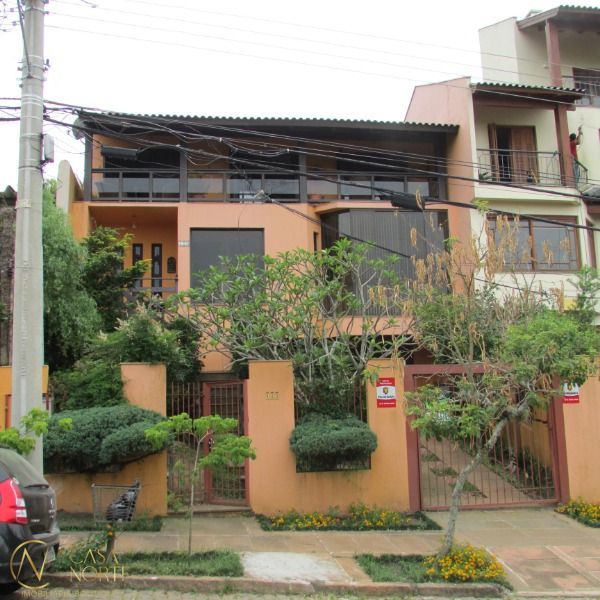 Casa à venda com 4 quartos, 340m², 2 suítes, 3 vagas, Rua Doutor Arnaldo da Silva Ferreira no bairro Jardim Isabel em Porto Alegre