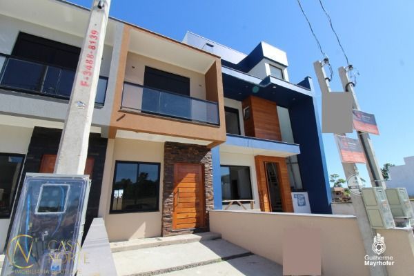 Casa à venda com 2 quartos, 107m², 2 suítes, 1 vaga, Rua Affonso Lunardelli no bairro Hípica em Porto Alegre