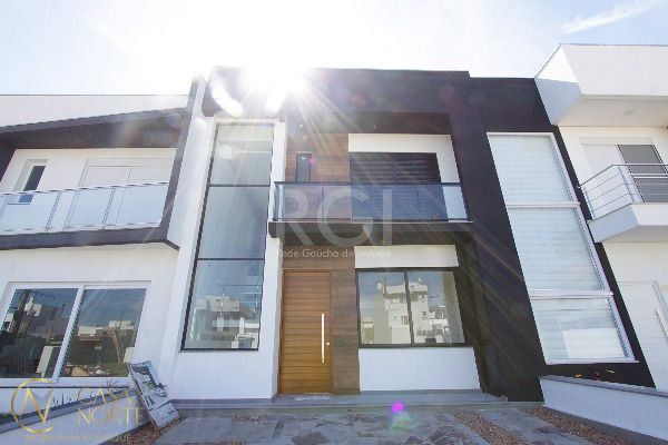 Casa de Condomínio à venda com 3 quartos, 153m², 1 suíte, 2 vagas, Rua Jorge Babot Miranda no bairro Aberta dos Morros em Porto Alegre