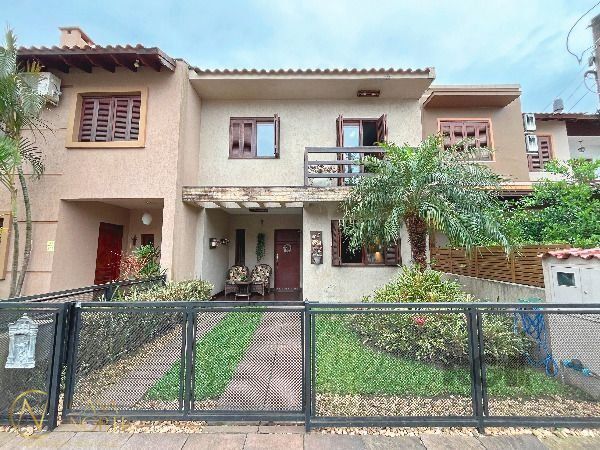 Casa à venda com 3 quartos, 125m², 1 suíte, 2 vagas, Rua Alexandre de Gusmão no bairro Hípica em Porto Alegre