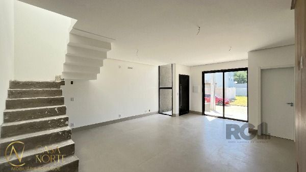 Casa de Condomínio à venda com 3 quartos, 143m², 1 suíte, 2 vagas, Estrada Jorge Pereira Nunes no bairro Campo Novo em Porto Alegre