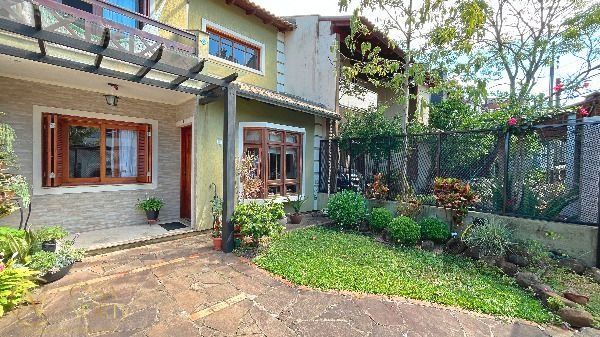 Casa à venda com 3 quartos, 140m², 1 suíte, 2 vagas, Rua Irany de Oliveira Santanna no bairro Hípica em Porto Alegre