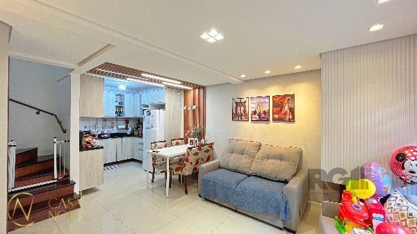 Casa de Condomínio à venda com 3 quartos, 128m², 1 suíte, 1 vaga, Rua dos Caiaguais no bairro Espírito Santo em Porto Alegre