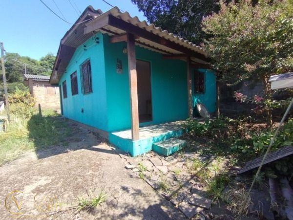 Casa à venda com 2 quartos, 60m², 1 vaga, Rua Oswaldo Olmiro Machado no bairro Ipanema em Porto Alegre