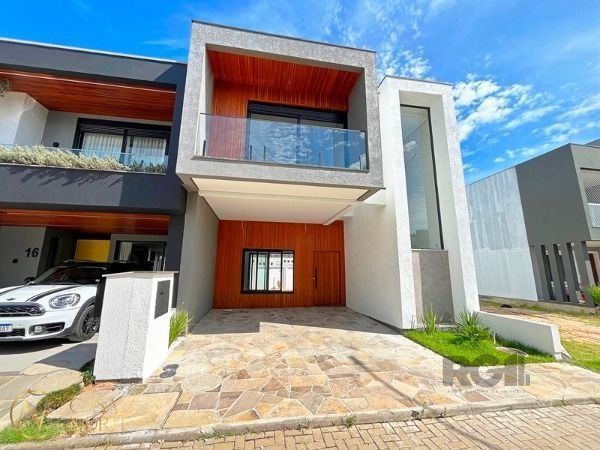 Casa de Condomínio à venda com 3 quartos, 190m², 3 suítes, 2 vagas, Rua Sinai no bairro Ipanema em Porto Alegre