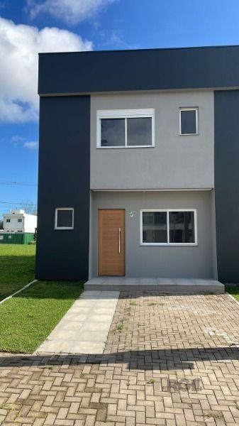 Casa de Condomínio à venda , 99m², 2 suítes, 2 vagas, Estrada Jorge Pereira Nunes no bairro Campo Novo em Porto Alegre