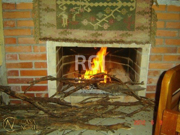 Casa à venda com 4 quartos, 150m², 2 suítes, 6 vagas, Rua Professora Celia Lang Lisboa no bairro Aberta dos Morros em Porto Alegre