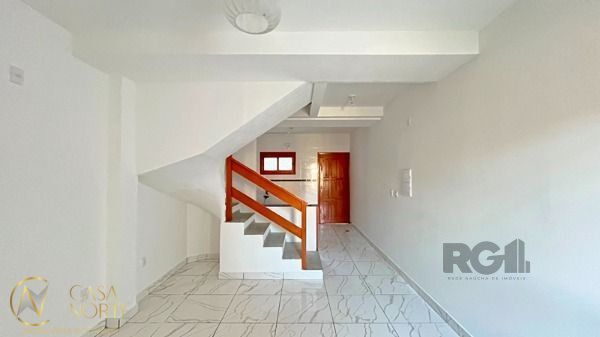 Casa à venda com 2 quartos, 79m², 2 suítes, 2 vagas, Rua Helio Felix Frey no bairro Espírito Santo em Porto Alegre