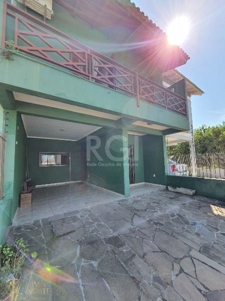 Casa à venda com 4 quartos, 207m², 2 vagas, Rua Constantino Fernando Onorato Bottin no bairro Hípica em Porto Alegre