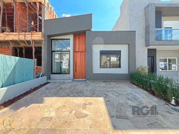Casa à venda com 3 quartos, 90m², 1 suíte, 2 vagas, Rua Eroni Soares Machado no bairro Hípica em Porto Alegre