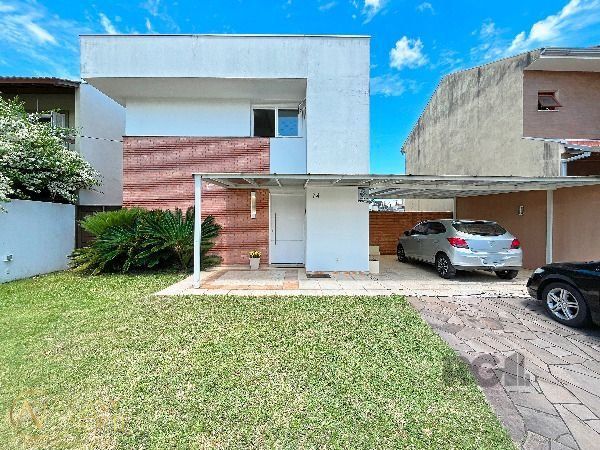 Casa à venda com 3 quartos, 230m², 3 suítes, 4 vagas, Rua Eroni Soares Machado no bairro Hípica em Porto Alegre