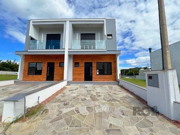 Casa de Condomínio à venda com 3 quartos, 115m², 1 suíte, 2 vagas, Estrada Jorge Pereira Nunes no bairro Campo Novo em Porto Alegre