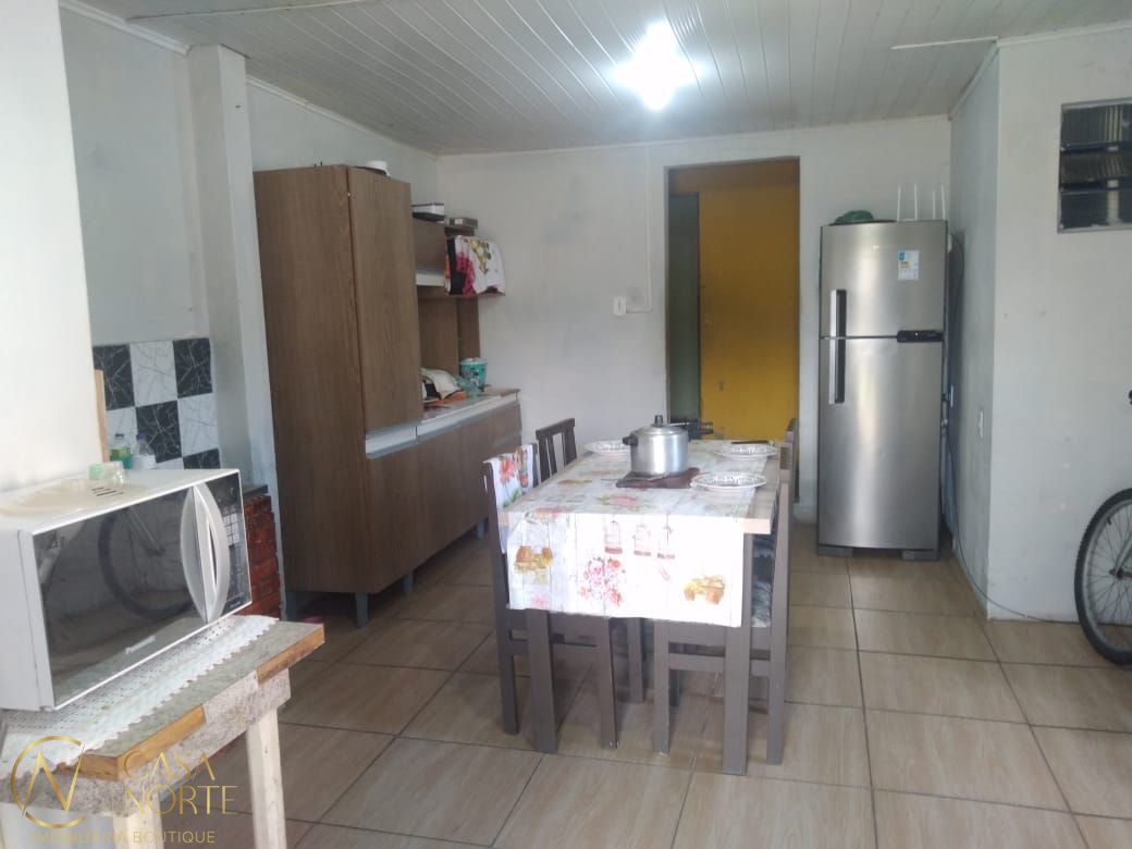 Casa à venda com 3 quartos, 75m², 5 vagas, Rua David Cherman no bairro Restinga em Porto Alegre