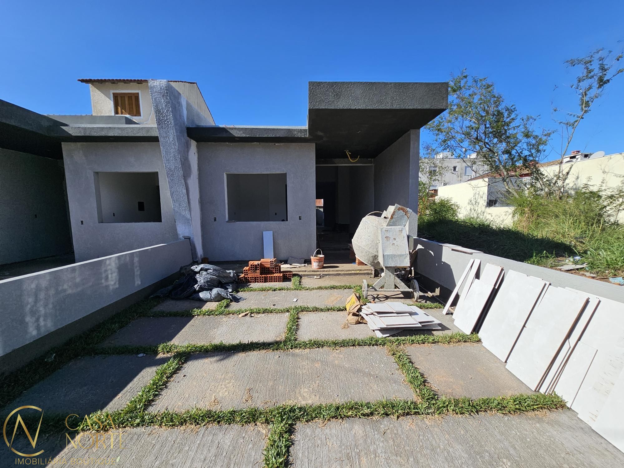Casa à venda com 2 quartos, 80m², 1 suíte, 2 vagas, Rua Hilário Gonçalves Pinha no bairro Hípica em Porto Alegre