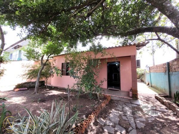 Casa à venda com 5 quartos, 110m², 3 vagas, Avenida Ignes E. Fagundes no bairro Restinga em Porto Alegre