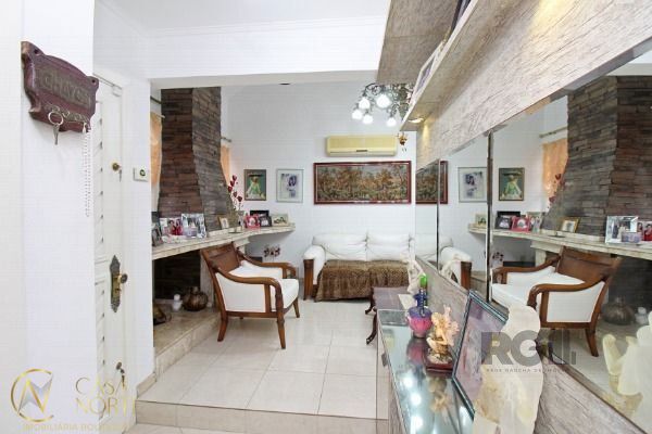 Casa de Condomínio à venda com 3 quartos, 201m², 1 suíte, 2 vagas, Rua Padre João Batista Reus no bairro Tristeza em Porto Alegre