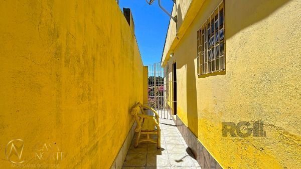 Casa à venda com 2 quartos, 140m², 1 vaga, Rua Tenente Ary Tarrago no bairro Jardim Itu em Porto Alegre
