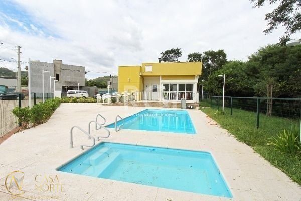 Casa de Condomínio à venda com 4 quartos, 115m², 2 suítes, Estrada Jorge Pereira Nunes no bairro Campo Novo em Porto Alegre
