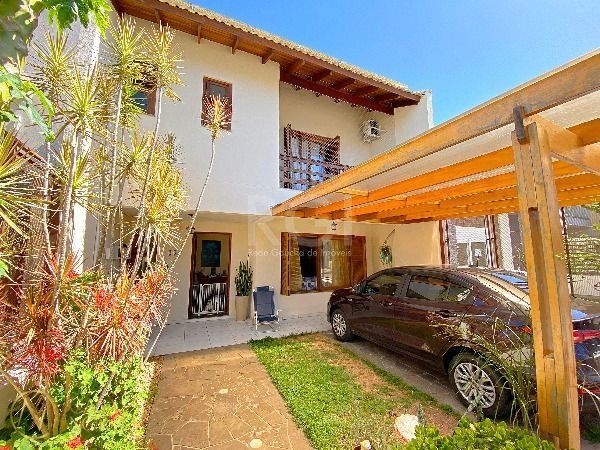 Casa à venda com 3 quartos, 159m², 1 suíte, 1 vaga, Rua Fabiana Kila de Avila no bairro Hípica em Porto Alegre