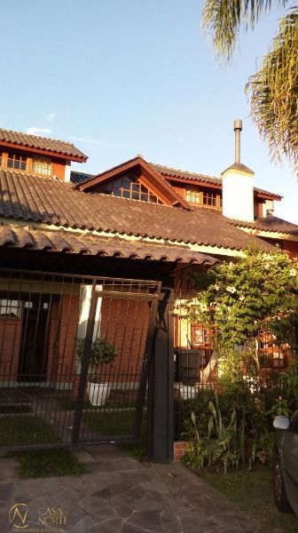 Casa à venda com 5 quartos, 254m², 1 suíte, 4 vagas, Rua Adao Pinheiro da Silva no bairro Aberta dos Morros em Porto Alegre