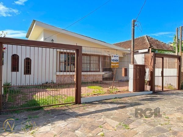 Casa à venda com 3 quartos, 155m², 2 vagas, Rua Otelo Rosa no bairro Ipanema em Porto Alegre