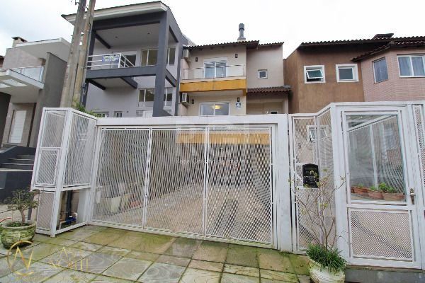 Casa à venda com 3 quartos, 171m², 1 suíte, 4 vagas, Rua Fabiana Kila de Avila no bairro Hípica em Porto Alegre