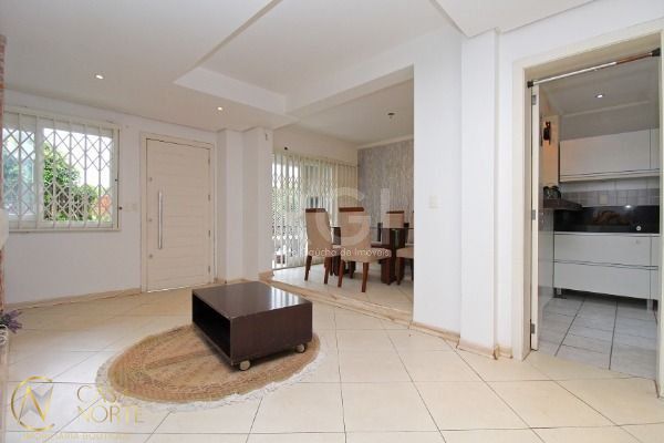 Casa de Condomínio à venda com 3 quartos, 215m², 1 suíte, 2 vagas, Doutor Arnaldo da Silva Ferreira no bairro Jardim Isabel em Porto Alegre