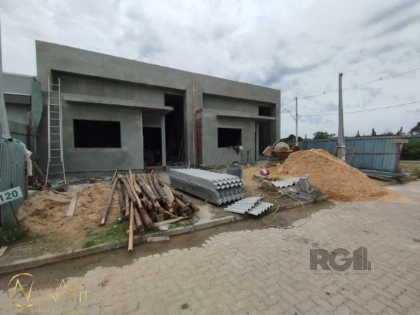 Casa de Condomínio à venda com 3 quartos, 95m², 1 suíte, 2 vagas, Avenida Juca Batista no bairro Hípica em Porto Alegre