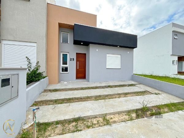 Casa de Condomínio à venda com 3 quartos, 102m², 1 suíte, 2 vagas, Rua Jean Vardaramatos no bairro Hípica em Porto Alegre