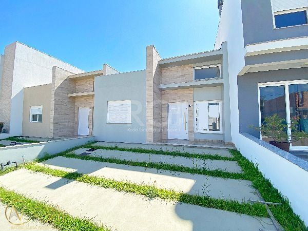 Casa de Condomínio à venda com 2 quartos, 91m², 2 suítes, 2 vagas, Rua Jean Vardaramatos no bairro Hípica em Porto Alegre