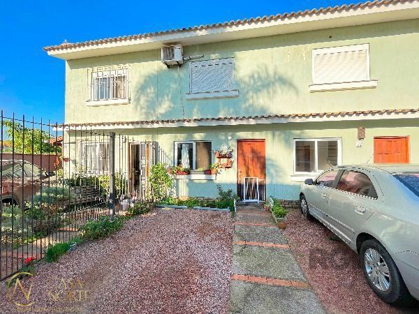 Casa de Condomínio à venda com 2 quartos, 97m², 1 vaga, Rua Dorival Castilhos Machado no bairro Aberta dos Morros em Porto Alegre
