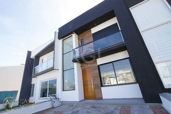 Casa de Condomínio à venda com 3 quartos, 153m², 1 suíte, 2 vagas, Rua Jorge Babot Miranda no bairro Aberta dos Morros em Porto Alegre