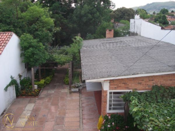 Casa à venda com 3 quartos, 280m², 1 suíte, 2 vagas, Rua General Gomes Carneiro no bairro Medianeira em Porto Alegre