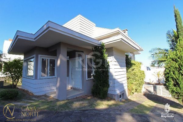 Casa de Condomínio à venda com 3 quartos, 280m², 1 suíte, 5 vagas, Rua Francisco Solano Borges no bairro Aberta dos Morros em Porto Alegre