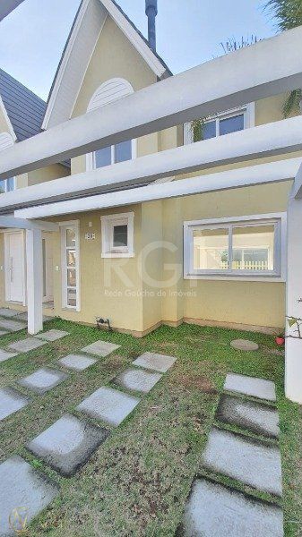 Casa de Condomínio à venda com 3 quartos, 128m², 1 suíte, 2 vagas, Rua Carlos Eduardo de Sa no bairro Aberta dos Morros em Porto Alegre