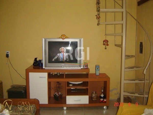 Casa à venda com 4 quartos, 150m², 2 suítes, 6 vagas, Rua Professora Celia Lang Lisboa no bairro Aberta dos Morros em Porto Alegre