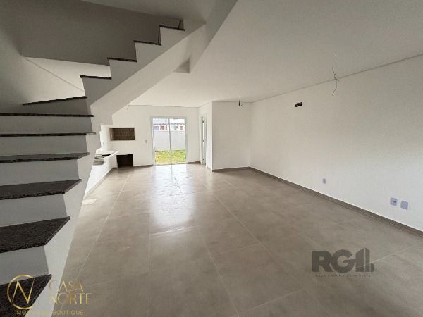 Casa de Condomínio à venda com 2 quartos, 99m², 2 suítes, 2 vagas, Estrada Jorge Pereira Nunes no bairro Campo Novo em Porto Alegre