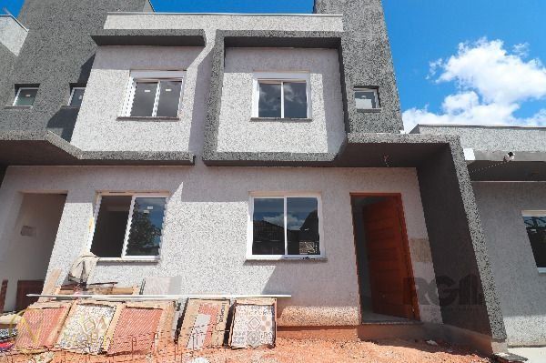 Casa de Condomínio à venda com 2 quartos, 59m², 1 vaga, Rua Miguel Ascoleze no bairro Vila Nova em Porto Alegre