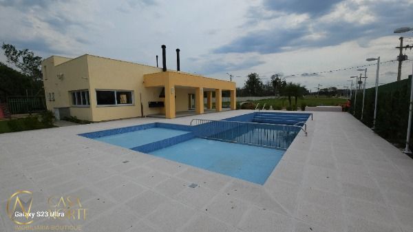 Casa de Condomínio à venda com 3 quartos, 97m², 1 suíte, 2 vagas, Avenida Juca Batista no bairro Hípica em Porto Alegre