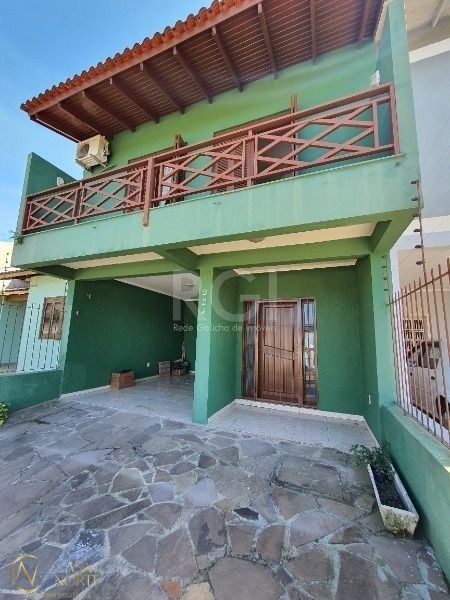 Casa à venda com 4 quartos, 207m², 2 vagas, Rua Constantino Fernando Onorato Bottin no bairro Hípica em Porto Alegre