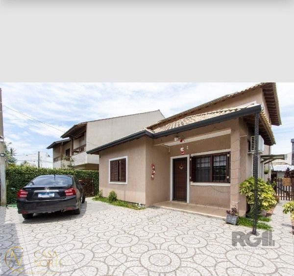 Casa à venda com 5 quartos, 152m², 1 suíte, 2 vagas, Rua Luzinete Alves Aragon no bairro Aberta dos Morros em Porto Alegre
