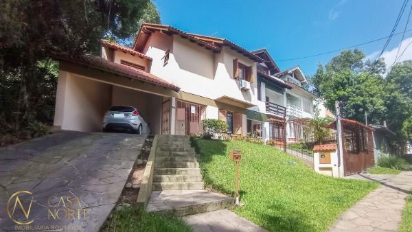 Casa à venda com 3 quartos, 169m², 1 suíte, 2 vagas, Rua Edgar Luiz Schneider no bairro Ipanema em Porto Alegre